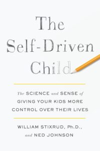 The book title The Self-Driven Child written in pencil on white book cover.
